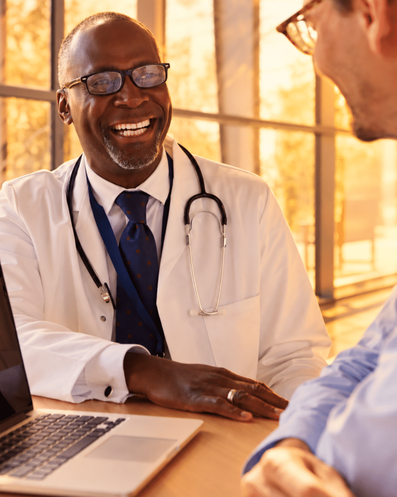Primary care physician speaking with patients